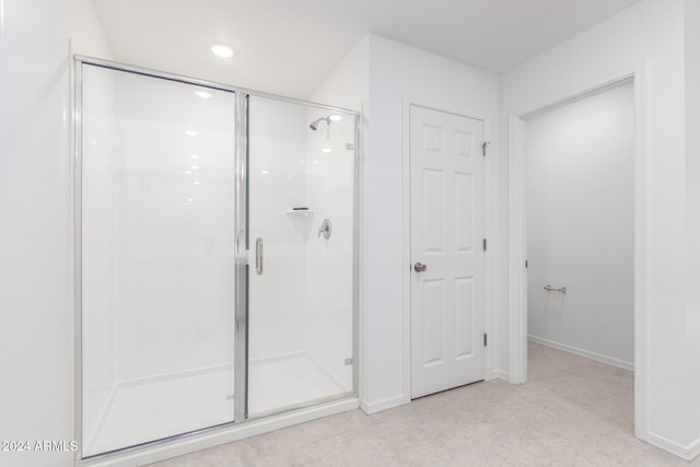 bathroom featuring walk in shower