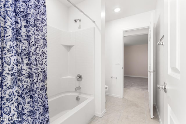 bathroom featuring tile patterned flooring and toilet