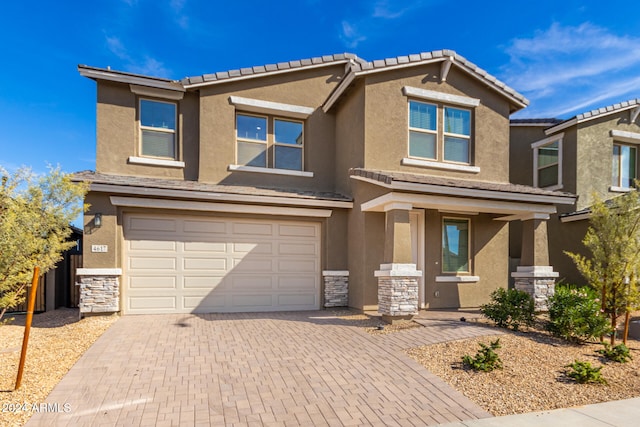 view of front of home with a garage