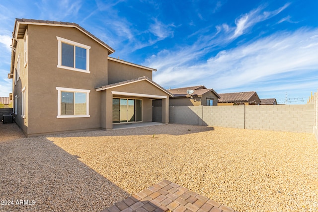 rear view of house featuring a patio area