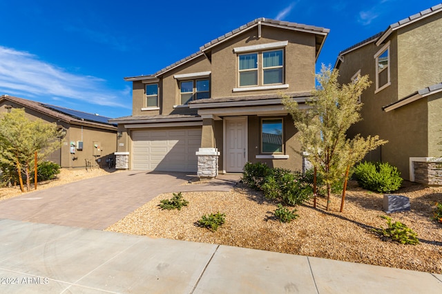 view of front of home featuring a garage