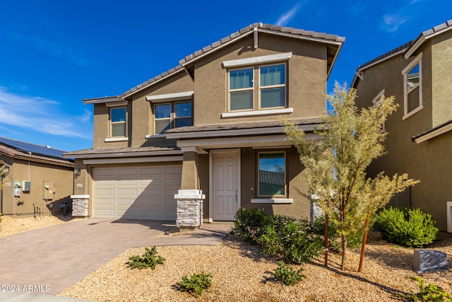 view of front of property featuring a garage