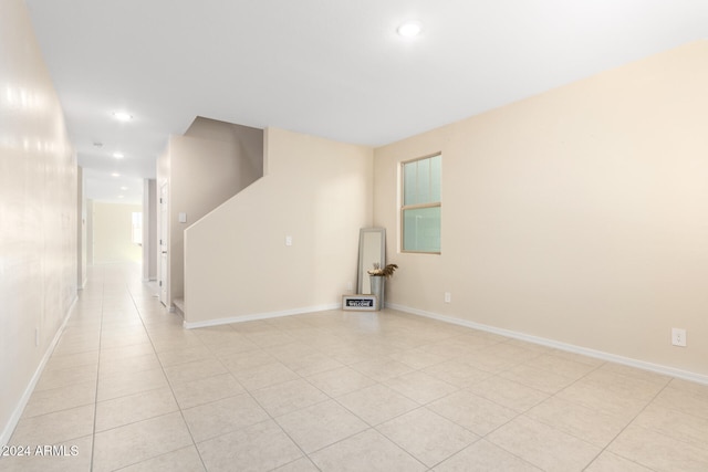 empty room featuring light tile patterned flooring