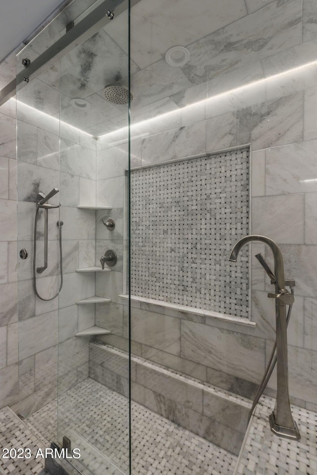 bathroom with an enclosed shower