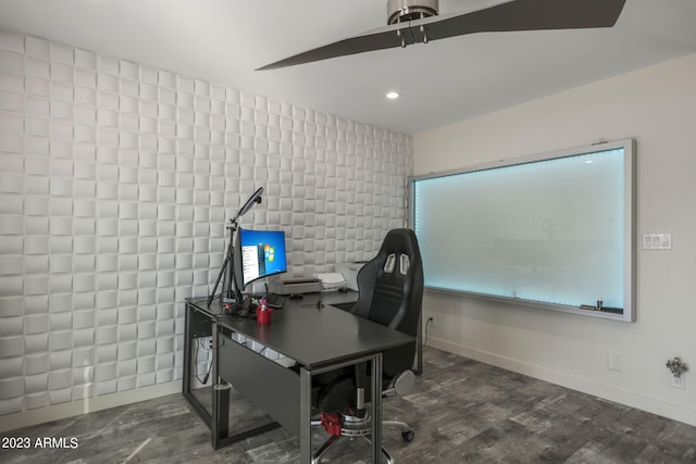 office area with tile walls and dark hardwood / wood-style flooring