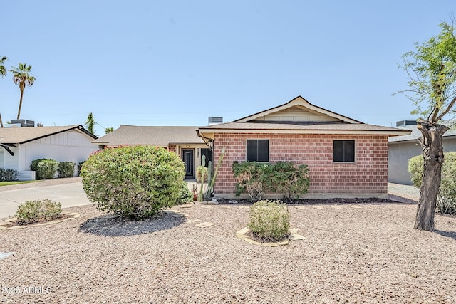 8713 E Sage Dr, Scottsdale, AZ 85250 - single story home featuring brick siding