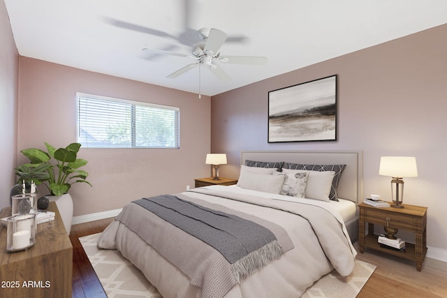 8713 E Sage Dr, Scottsdale, AZ 85250 - bedroom with light wood-style flooring, baseboards, and a ceiling fan