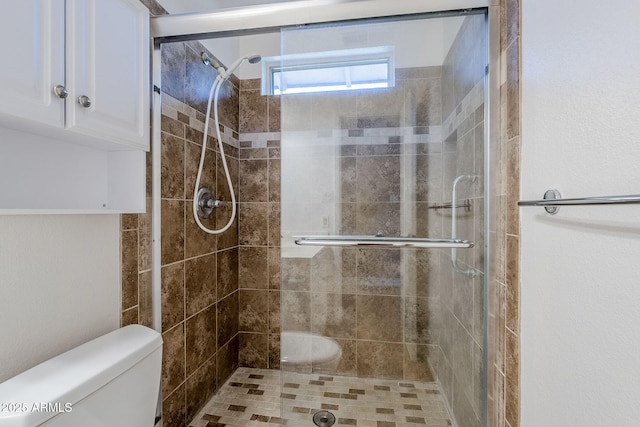 8713 E Sage Dr, Scottsdale, AZ 85250 - full bathroom featuring a shower stall and toilet