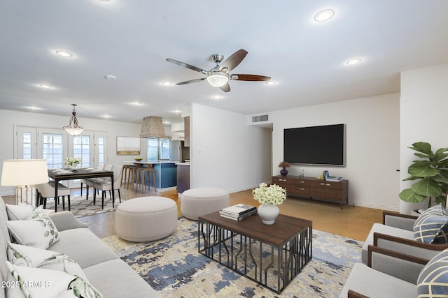 8713 E Sage Dr, Scottsdale, AZ 85250 - living area with baseboards, ceiling fan, and recessed lighting