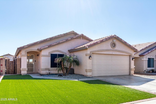 view of front of house with a garage and a front yard