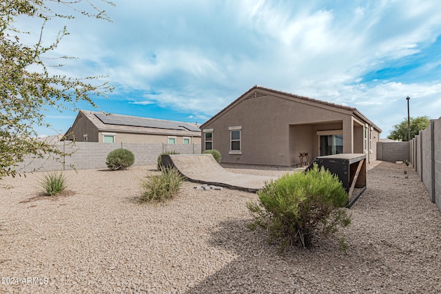 back of property featuring a patio