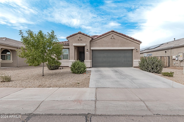 view of front of home with a garage