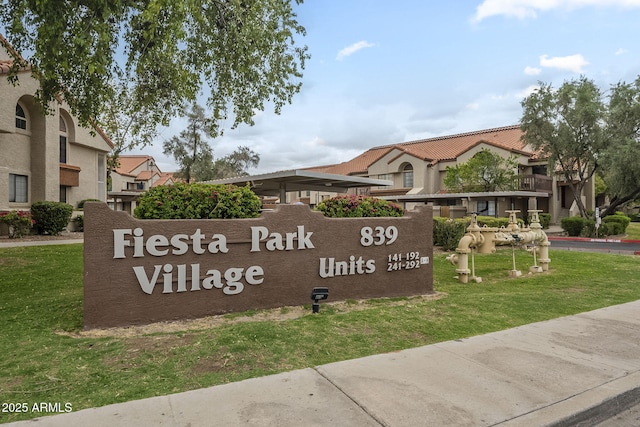 community sign with a yard