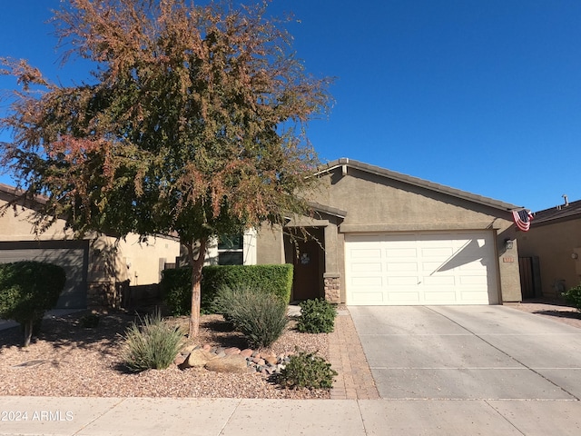 view of front of property featuring a garage