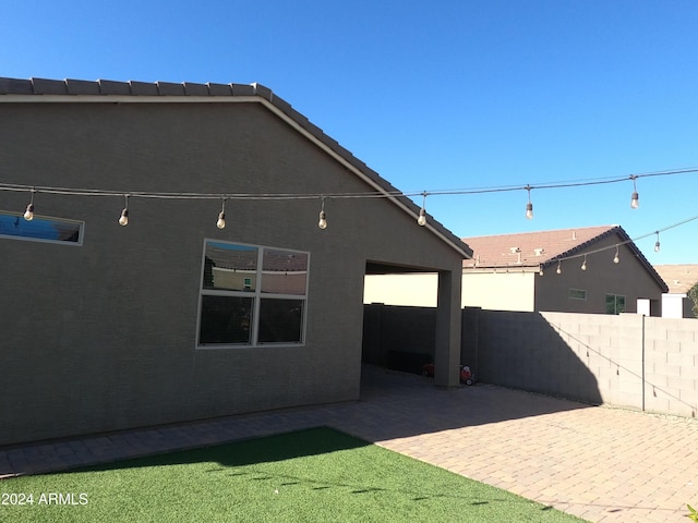 back of house featuring a patio area