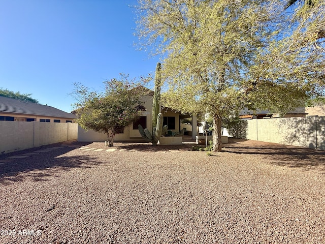 4643 E Cherry Hills Dr, Chandler, AZ 85249 - rear view of property featuring a fenced backyard, a patio area, and stucco siding