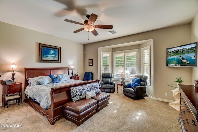 carpeted bedroom featuring ceiling fan