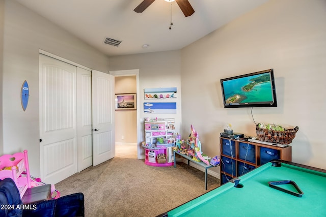 recreation room with ceiling fan, carpet, and pool table