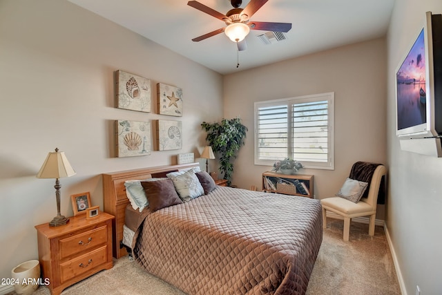 bedroom with ceiling fan and carpet