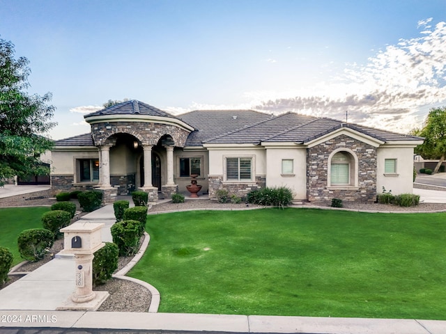 view of front of home with a front yard