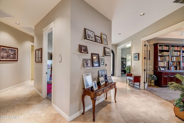 corridor featuring tile flooring