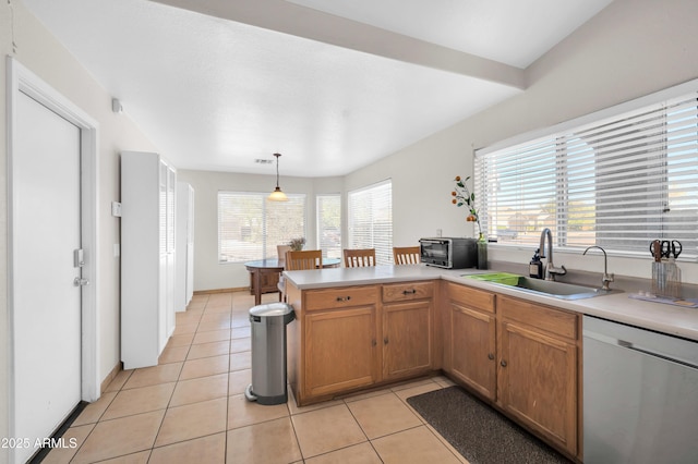 7405 W Elwood St, Phoenix, AZ 85043 - kitchen featuring dishwasher, a sink, a peninsula, and light tile patterned floors