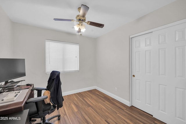 7405 W Elwood St, Phoenix, AZ 85043 - home office with baseboards, wood finished floors, and ceiling fan
