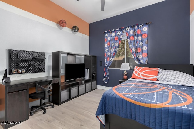 bedroom featuring ceiling fan and light hardwood / wood-style floors