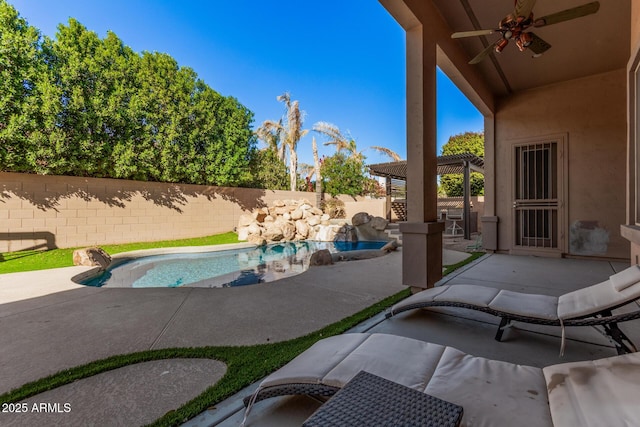 view of pool featuring ceiling fan and a patio