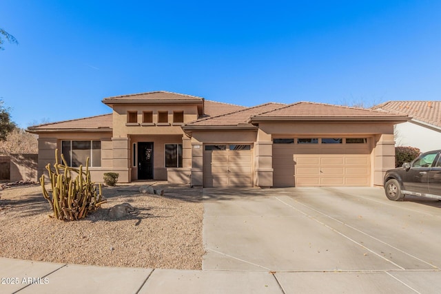 prairie-style home featuring a garage