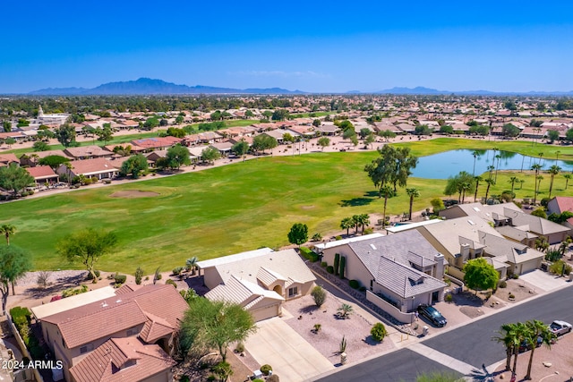 bird's eye view with a water and mountain view