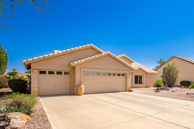 view of front of home with a garage