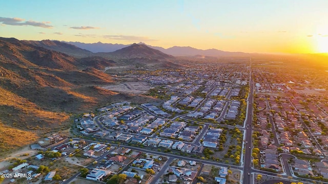 drone / aerial view featuring a mountain view