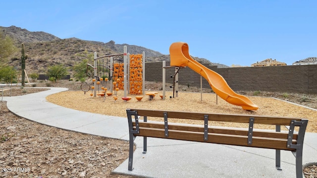 community playground featuring a mountain view