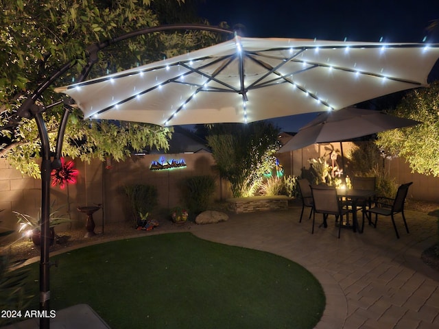 view of patio at twilight