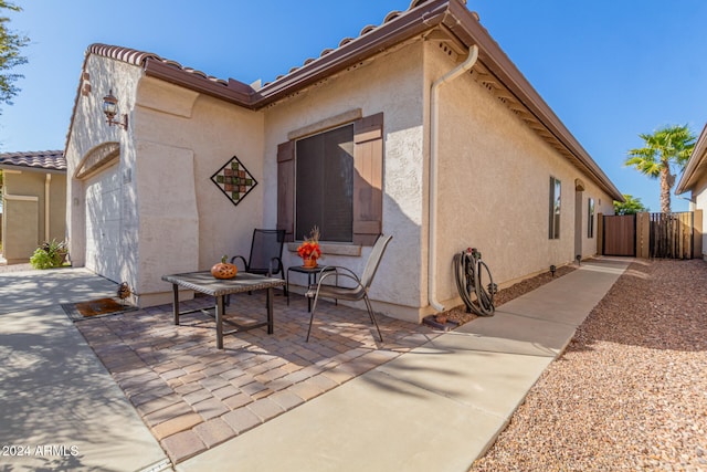 view of home's exterior with a patio area