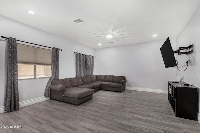 23848 W Grove St, Buckeye, AZ 85326 - living room featuring a ceiling fan, visible vents, recessed lighting, light wood finished floors, and baseboards