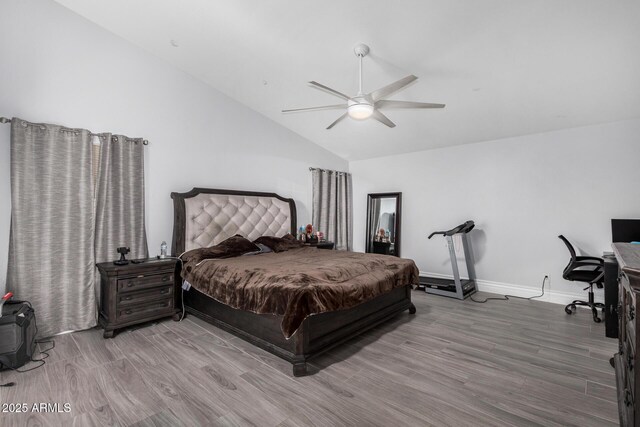 23848 W Grove St, Buckeye, AZ 85326 - bedroom with ceiling fan, baseboards, wood finished floors, and lofted ceiling