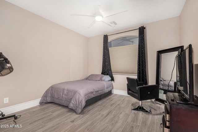 23848 W Grove St, Buckeye, AZ 85326 - bedroom with visible vents, baseboards, a ceiling fan, and wood finished floors