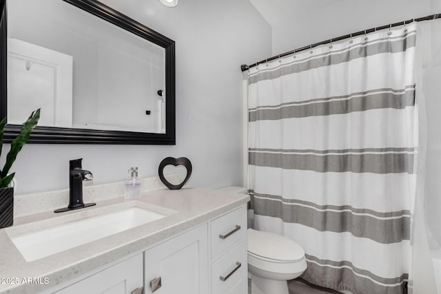 23848 W Grove St, Buckeye, AZ 85326 - bathroom with a shower with shower curtain, vanity, and toilet