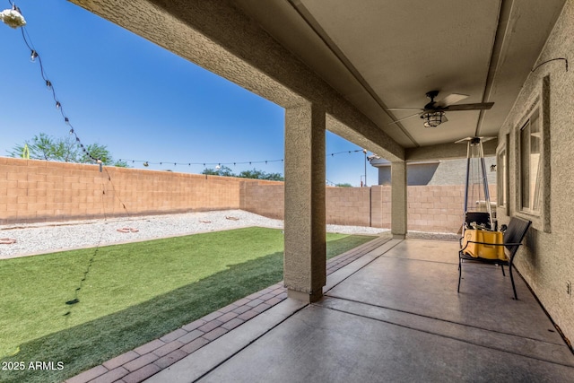 23848 W Grove St, Buckeye, AZ 85326 - view of patio / terrace with a fenced backyard and ceiling fan