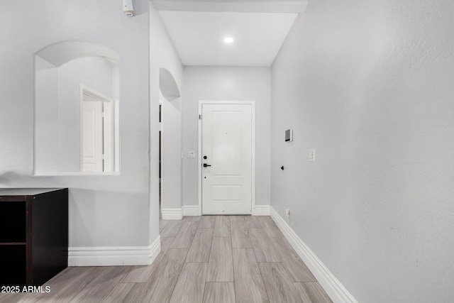 23848 W Grove St, Buckeye, AZ 85326 - hall with light wood-style flooring and baseboards