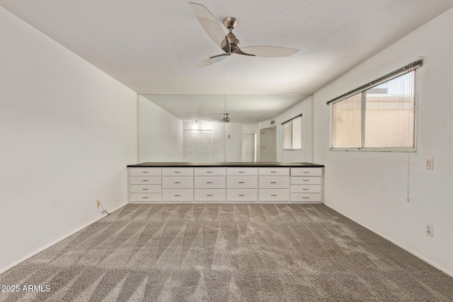 8328 E Chaparral Rd, Scottsdale, AZ 85250 - carpeted empty room featuring a ceiling fan and healthy amount of natural light