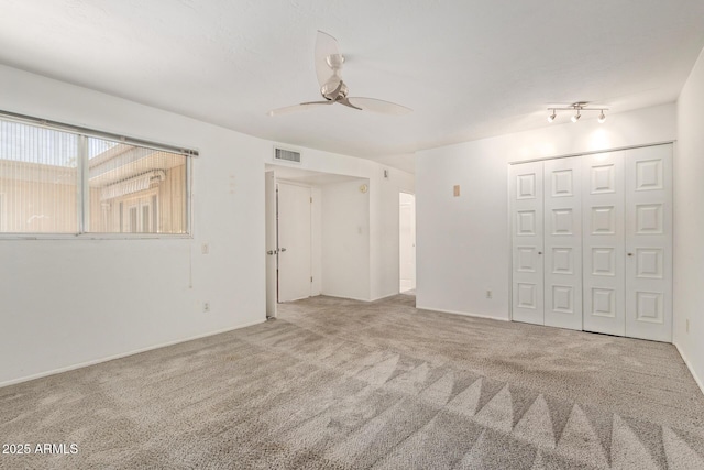 8328 E Chaparral Rd, Scottsdale, AZ 85250 - carpeted empty room featuring ceiling fan