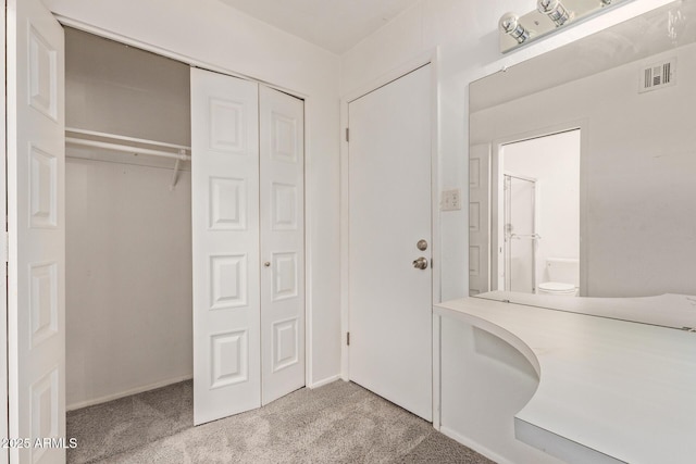 8328 E Chaparral Rd, Scottsdale, AZ 85250 - unfurnished bedroom featuring carpet flooring, a closet, and baseboards