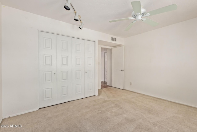 8328 E Chaparral Rd, Scottsdale, AZ 85250 - unfurnished bedroom featuring carpet, a closet, and ceiling fan