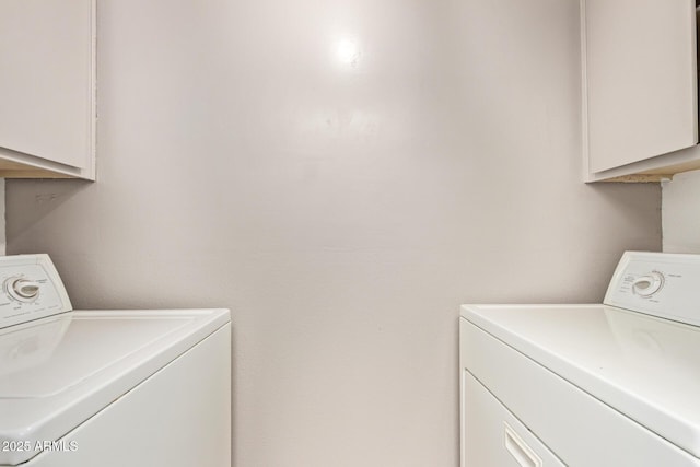 8328 E Chaparral Rd, Scottsdale, AZ 85250 - laundry area with cabinet space and washer and dryer