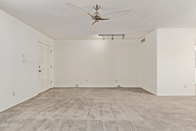 8328 E Chaparral Rd, Scottsdale, AZ 85250 - carpeted spare room with ceiling fan and track lighting
