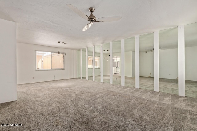 8328 E Chaparral Rd, Scottsdale, AZ 85250 - unfurnished living room with a ceiling fan and carpet