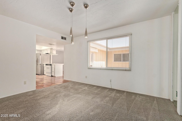 8328 E Chaparral Rd, Scottsdale, AZ 85250 - carpeted empty room featuring tile patterned flooring